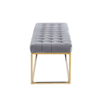 Banc tapissé en velours capitonné avec pieds en chrome doré