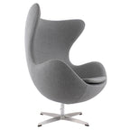 Fauteuil de salon pivotant avec coque ailée